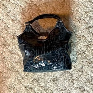 black crocodile print handbag